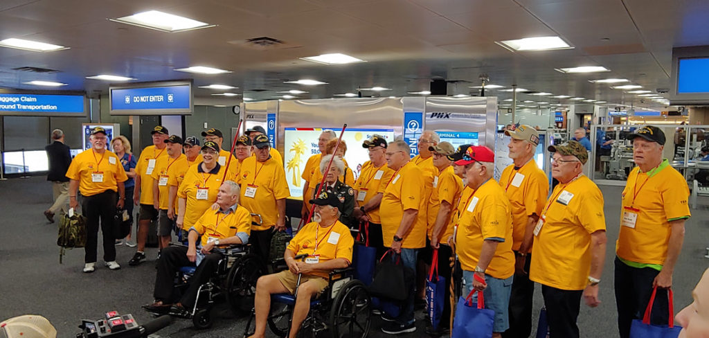Honor Flight veterans wait to board their honorary flight.